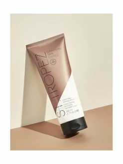 Gradual Tan Tinted Daily -kiinteyttävä itseruskettava voide 200 ml