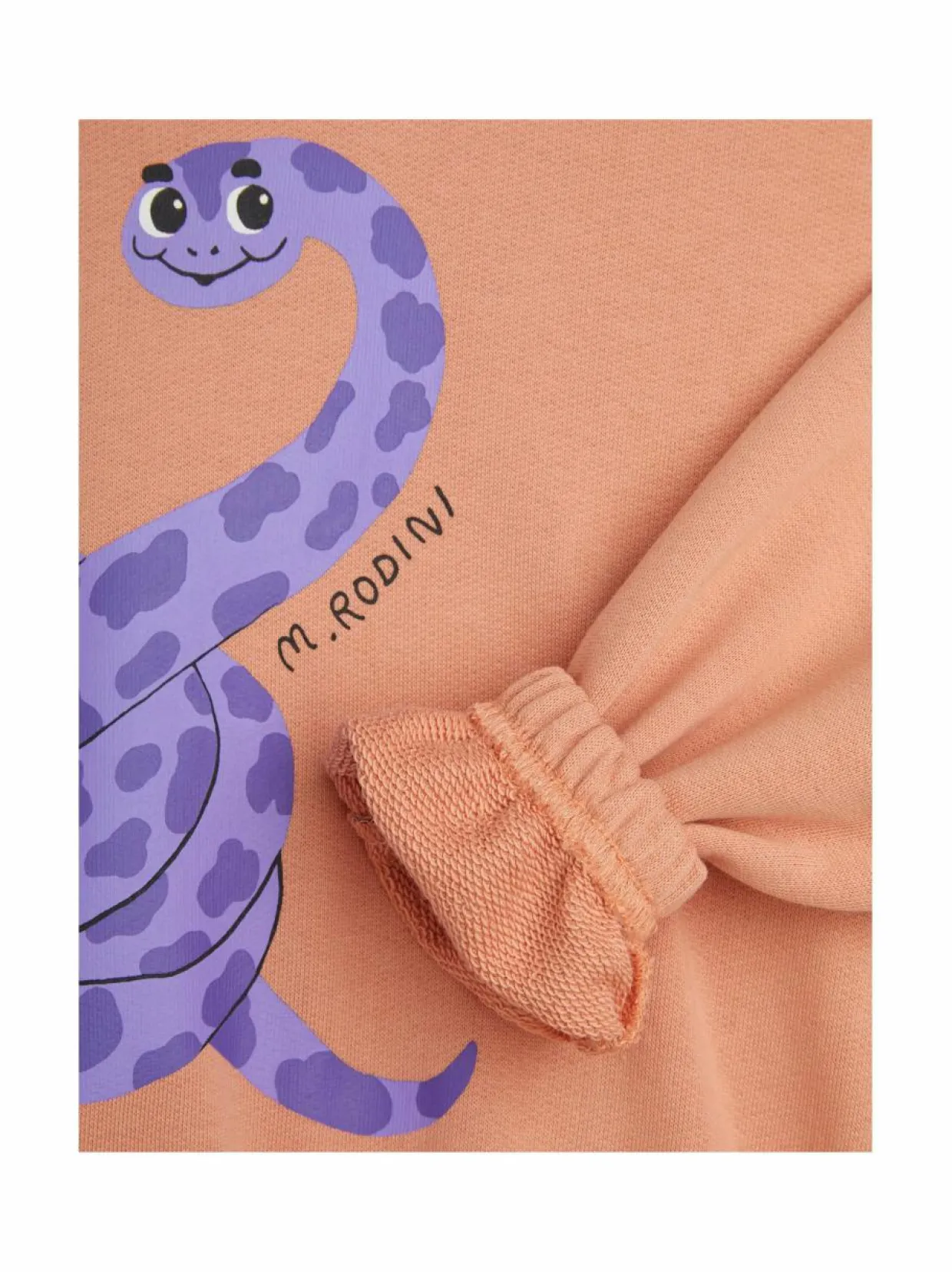 Käärmekuvioinen collegepaita