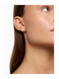 The Luna -kullatut nappikorvakorut